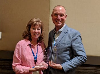 Tower+of+Excellence+Awards+2018-+Piper+Ayala,+Vice+President,+and+Brad+Burleson,+Operations+Manager,+ExecuStay+and+Oakwood+Midwest